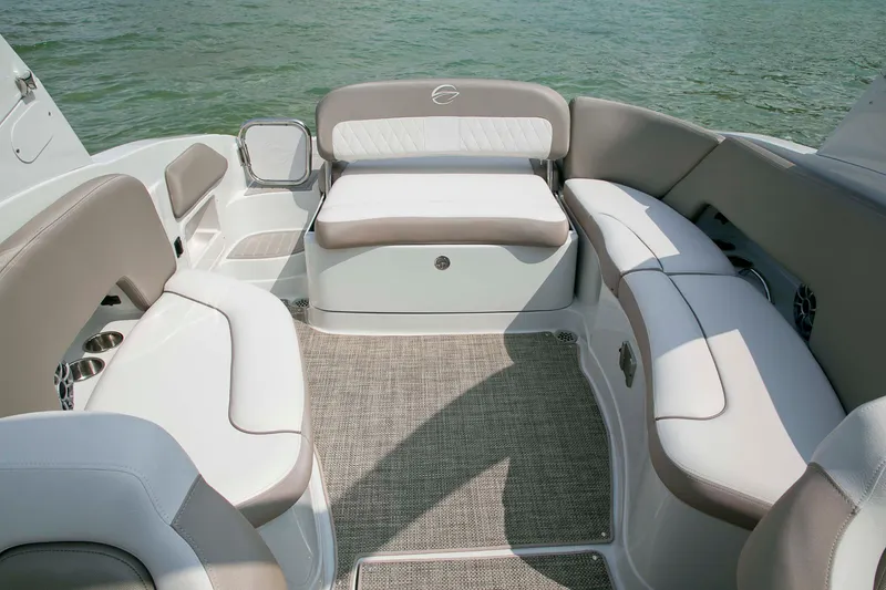 Slide: The Image of 2026 Crownline Eclipse E275 boat interior with plush seating and elegant design. - 9