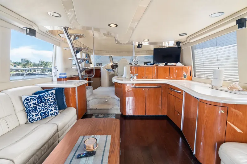 Slide: The Image of Luxurious interior of 2001 Sea Ray 540 Cockpit Motor Yacht with elegant wood finishes. - 20