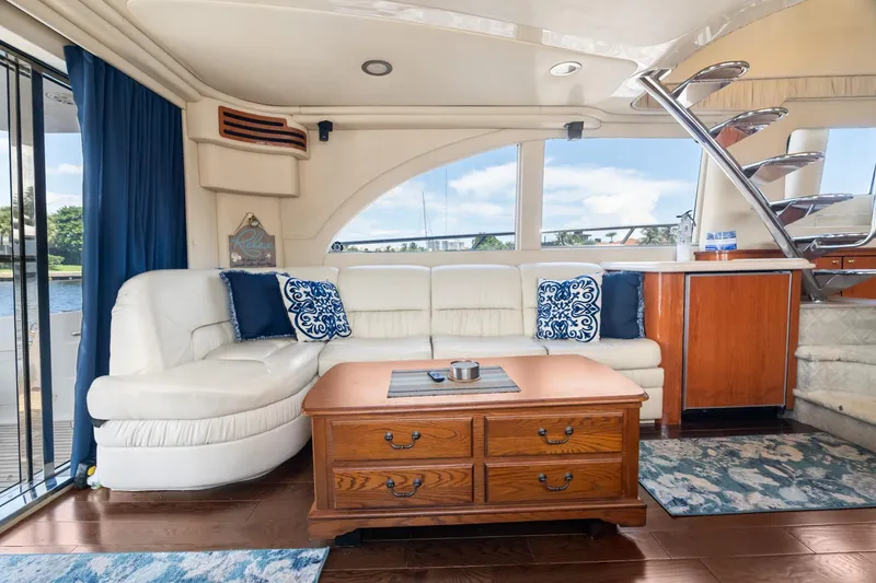 Slide: The Image of Luxurious interior of 2001 Sea Ray 540 Cockpit Motor Yacht with elegant seating and wooden accents. - 22