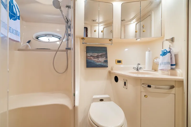 Slide: The Image of Luxurious bathroom in 2001 Sea Ray 540 Cockpit Motor Yacht with shower and vanity. - 31