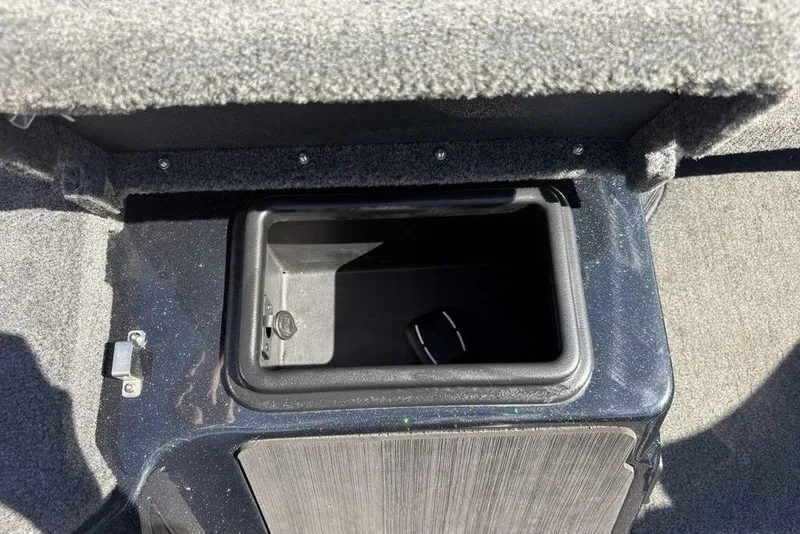 Slide: The Image of 2024 Skeeter ZXR20 storage compartment with open lid, showcasing interior space. - 11
