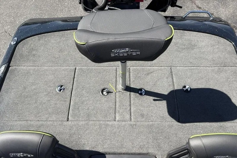 Slide: The Image of 2024 Skeeter ZXR20 boat deck with cushioned seat and storage compartments. - 25