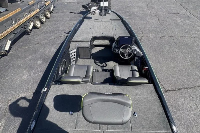 Slide: The Image of 2024 Skeeter ZXR20 boat interior with seating and steering console. - 29