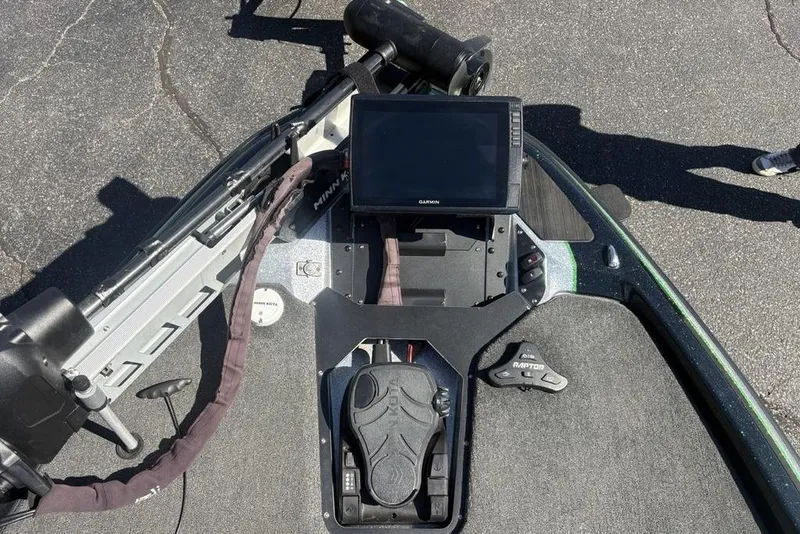 Slide: The Image of 2024 Skeeter ZXR20 boat dashboard with Garmin display and Minn Kota trolling motor. - 8