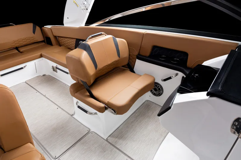 Slide: The Image of 2026 Four Winns H9 OB boat interior with tan leather seating and modern design. - 19