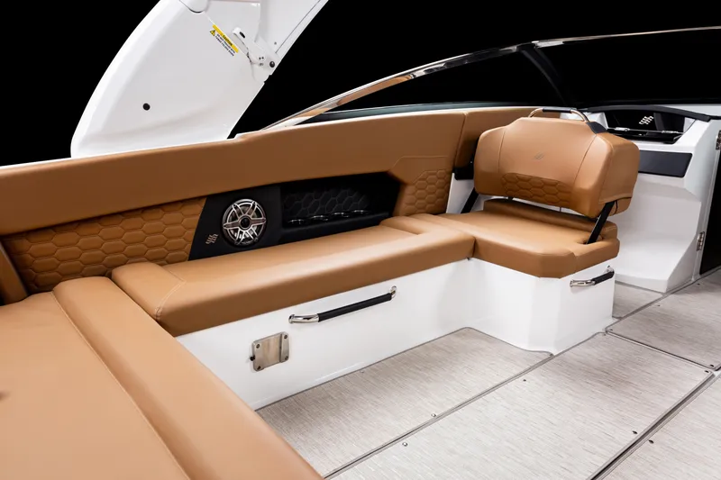 Slide: The Image of 2026 Four Winns H9 OB boat interior with tan leather seating and modern design. - 24