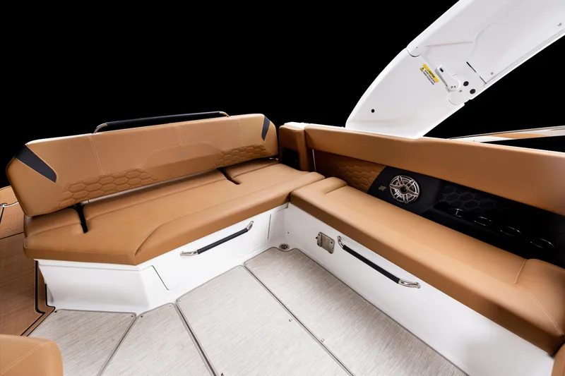 Slide: The Image of 2026 Four Winns H9 OB boat interior with tan leather seating and modern design. - 25