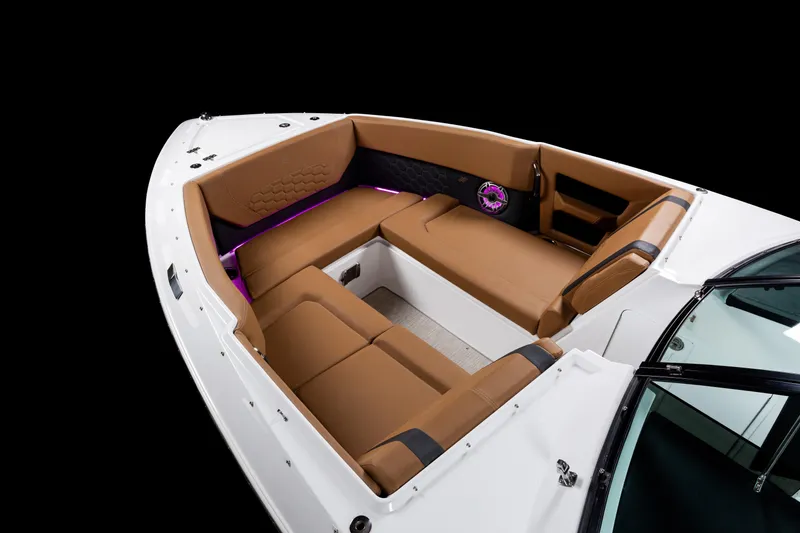 Slide: The Image of Luxurious interior of 2026 Four Winns H9 OB boat with brown seating and ambient lighting. - 27