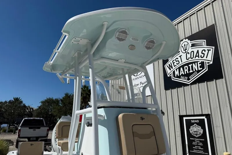 Slide: The Image of 2026 Sea Pro 210 Bay boat at West Coast Marine dealership, featuring sleek design and modern amenities. - 5