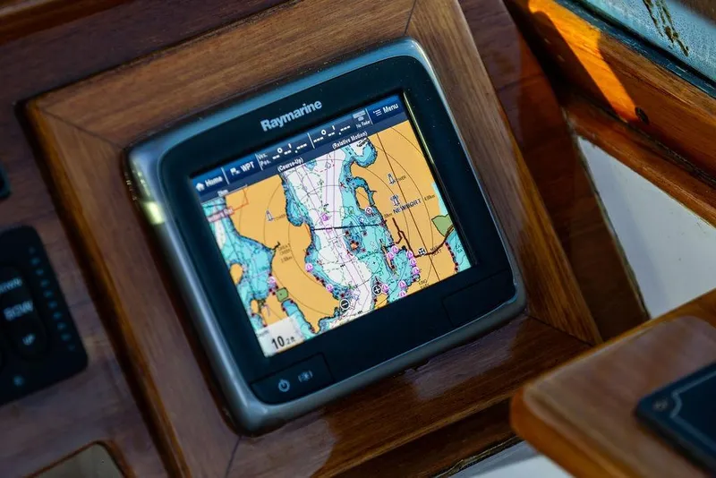 Slide: The Image of Raymarine navigation display on 2005 Hinckley Talaria 29R, showing detailed nautical chart. - 21