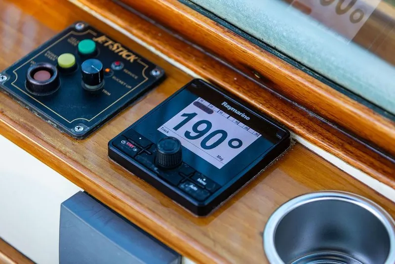 Slide: The Image of Hinckley Talaria 29R 2005 dashboard with Raymarine display and control panel. - 23