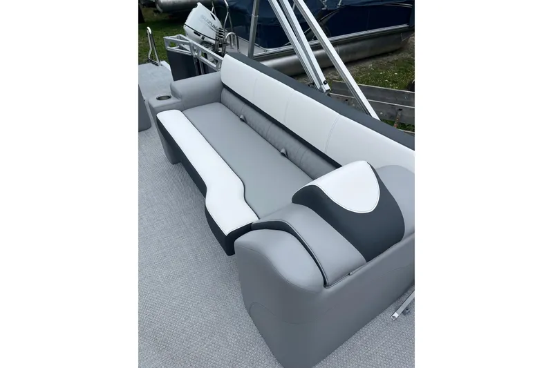 Slide: The Image of Luxurious seating on 2026 Avalon 25 LSZ ELITE pontoon boat, featuring sleek gray and white upholstery. - 5