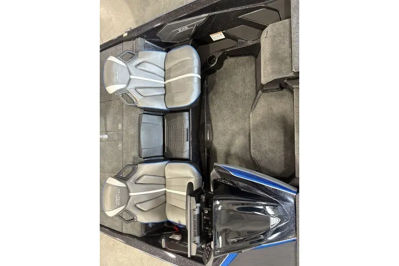 Slide: The Image of 2026 Skeeter ZXE20 boat interior with dual gray seats and sleek design. - 11