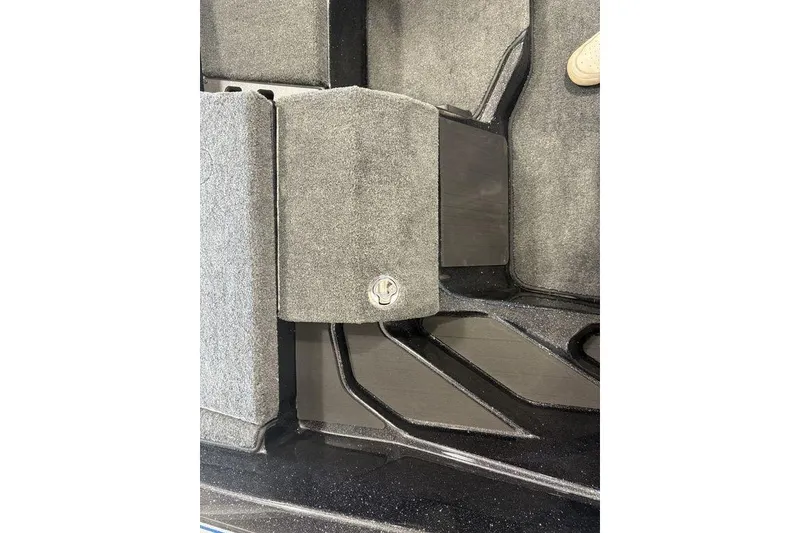 Slide: The Image of Interior view of 2026 Skeeter ZXE20 boat with carpeted storage compartment. - 13