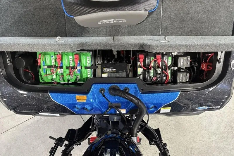 Slide: The Image of Battery compartment of 2026 Skeeter ZXE20 boat, showcasing multiple Interstate batteries. - 22