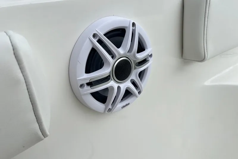 Slide: The Image of White speaker on 2026 Key West 239 FS boat interior, featuring sleek design. - 29