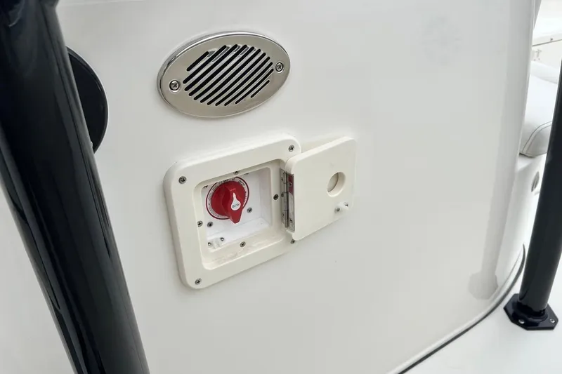Slide: The Image of 2026 Key West 239 FS boat battery switch and speaker detail. - 35