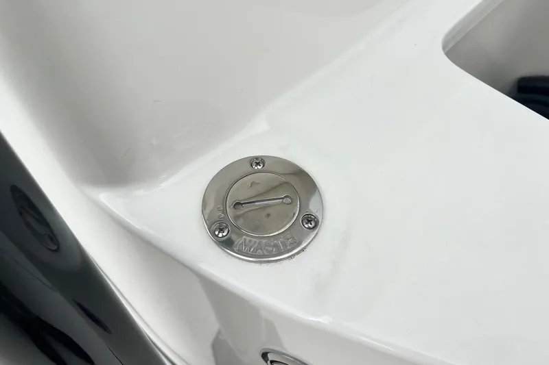 Slide: The Image of Key West 239 FS 2026 boat waste cap on white surface. - 37