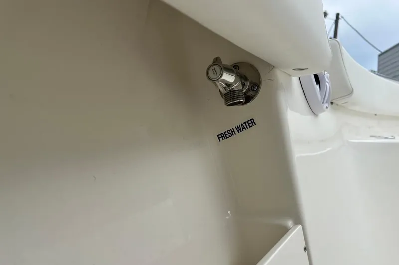Slide: The Image of Fresh water outlet on 2026 Key West 239 FS boat, close-up view. - 41