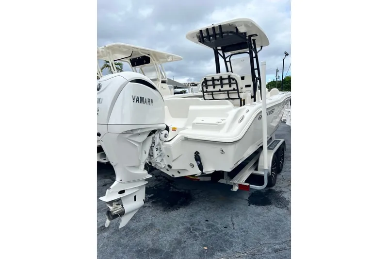 Slide: The Image of 2026 Key West 239 FS boat with Yamaha engine on trailer, rear view. - 8