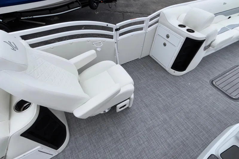 Slide: The Image of 2026 JC NEPTOON 27TT SPORT boat interior with white seating and modern design. - 15