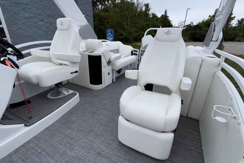 Slide: The Image of Luxurious interior of 2026 JC NEPTOON 27TT SPORT boat with white seating and modern design. - 17