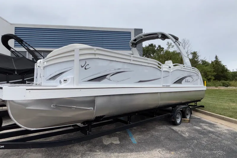 Slide: The Image of 2026 JC NEPTOON 27TT SPORT pontoon boat on trailer, parked outdoors. - 3