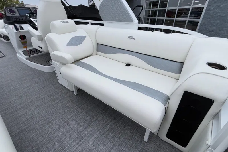 Slide: The Image of 2026 JC NEPTOON 27TT SPORT boat interior with white and gray seating. - 20