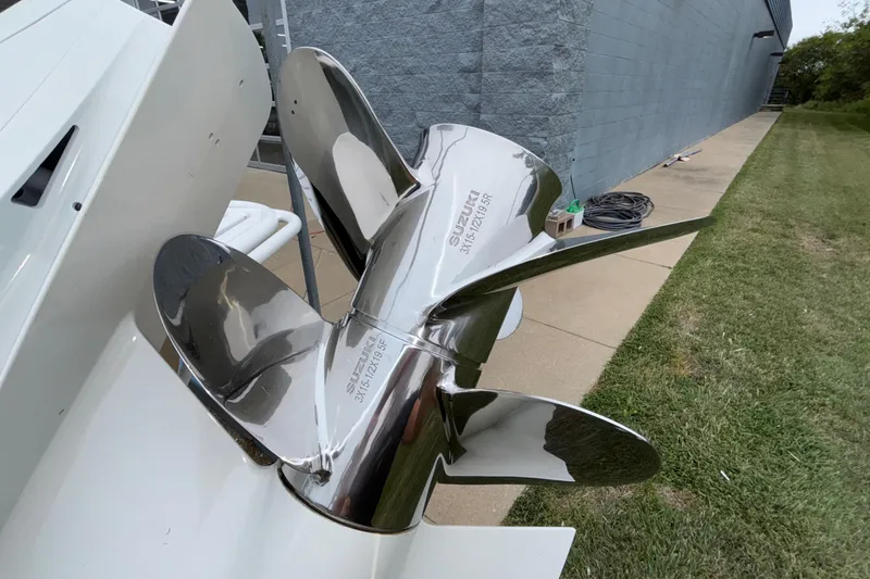 Slide: The Image of Shiny propeller of 2026 JC NEPTOON 27TT SPORT boat, close-up view. - 26