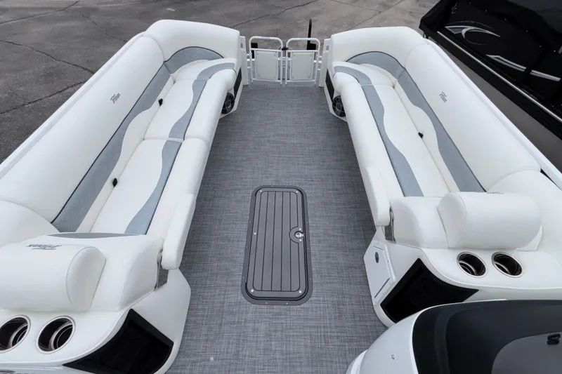 Slide: The Image of Luxurious 2026 JC NEPTOON 27TT SPORT pontoon boat interior with plush seating. - 4