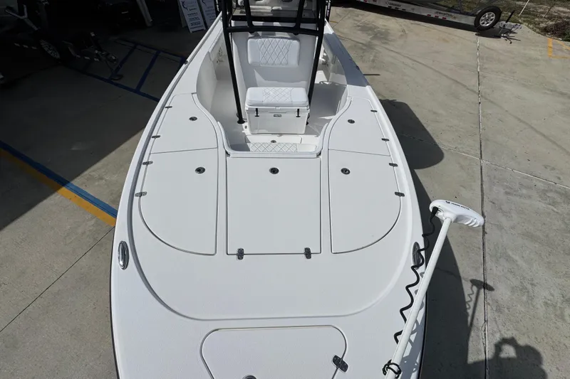 Slide: The Image of 2021 Blazer Bay 2700 Hybrid boat deck with seating and storage compartments. - 18