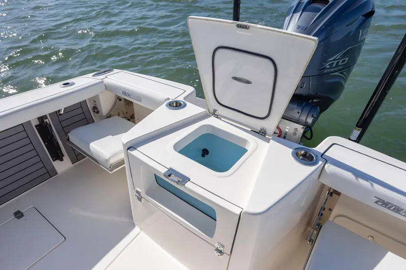 Slide: The Image of 2023 Pathfinder 2700 Open boat interior with open storage compartment and Yamaha engine. - 18