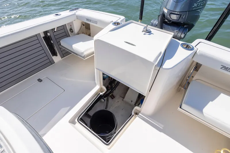 Slide: The Image of 2023 Pathfinder 2700 Open boat interior with storage and seating, featuring a Yamaha outboard motor. - 30