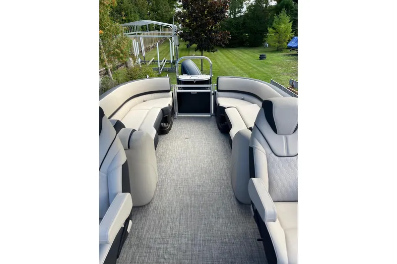 Slide: The Image of 2026 Avalon 25 LSZ Quad Lounger interior with luxurious seating and spacious layout. - 4