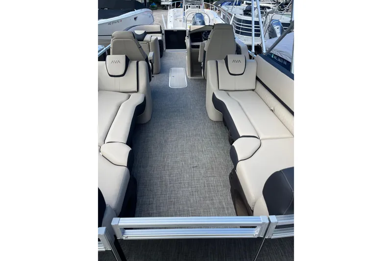 Slide: The Image of 2026 Avalon 25 LSZ Quad Lounger interior with luxurious seating and modern design. - 7