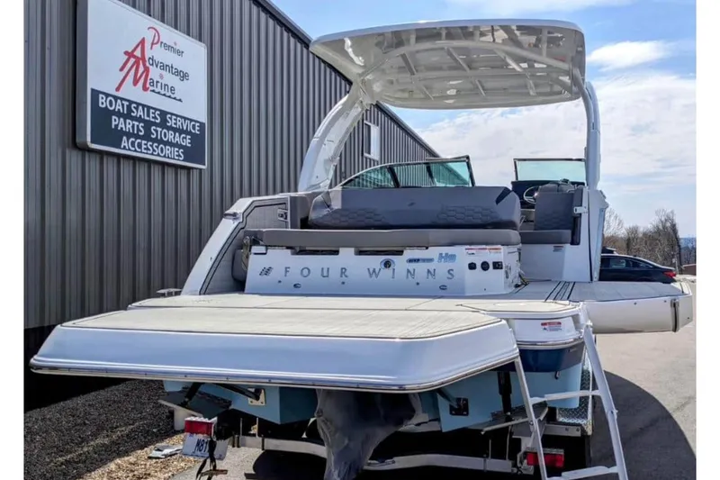 Slide: The Image of 2025 Four Winns H9 boat at Premier Advantage Marine dealership. - 3