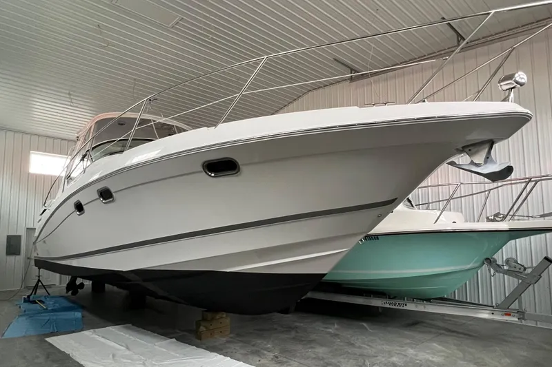 The Image of 2008 Four Winns 378 Vista boat in indoor storage, side view. - 0
