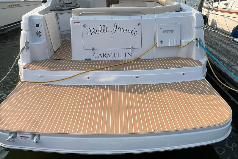 Slide: The Image of 2008 Four Winns 378 Vista boat with teak deck, named "Belle Journée II," docked in Carmel, IN. - 10