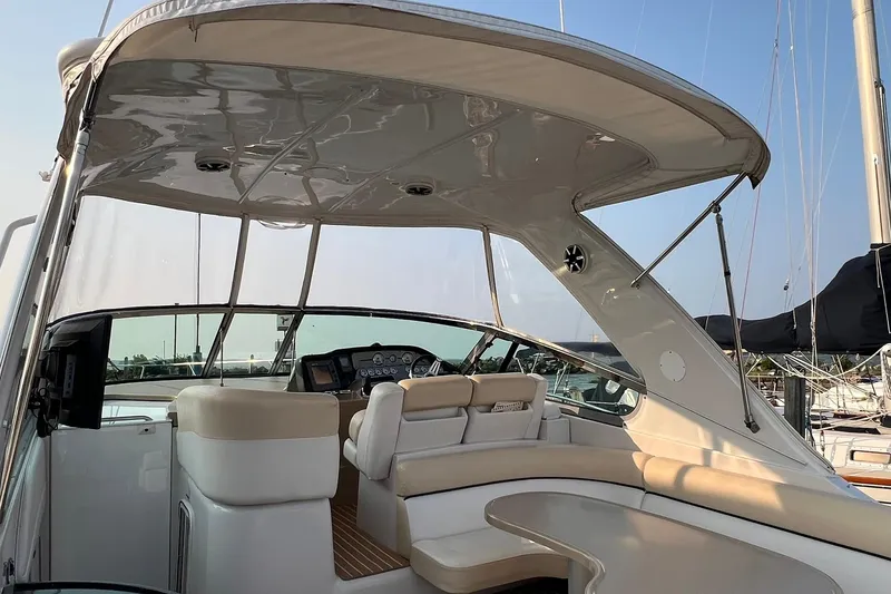 Slide: The Image of 2008 Four Winns 378 Vista yacht interior with helm and seating area. - 14