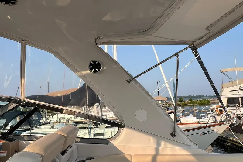 Slide: The Image of Interior view of a 2008 Four Winns 378 Vista yacht docked at a marina. - 18