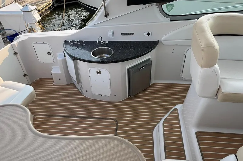 Slide: The Image of 2008 Four Winns 378 Vista yacht interior with kitchenette, sink, and seating area. - 20