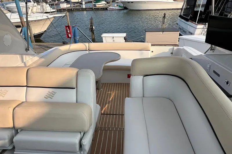Slide: The Image of Luxurious 2008 Four Winns 378 Vista yacht interior with elegant seating and waterfront view. - 25