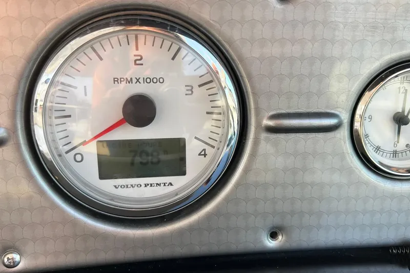 Slide: The Image of Volvo Penta RPM gauge on 2008 Four Winns 378 Vista boat dashboard. - 31