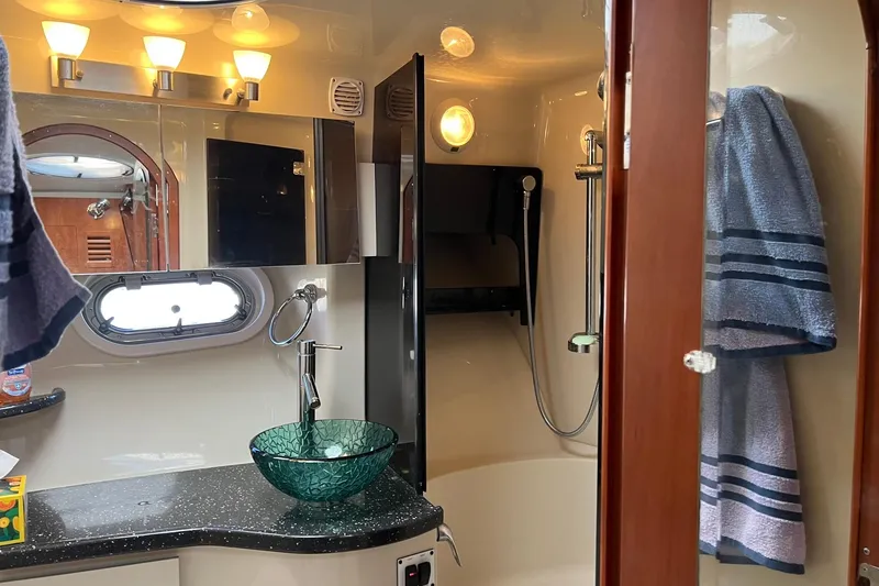 Slide: The Image of Luxurious bathroom in 2008 Four Winns 378 Vista yacht with modern fixtures and elegant design. - 38