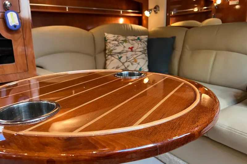 Slide: The Image of Luxurious interior of 2008 Four Winns 378 Vista yacht with elegant wood table. - 39