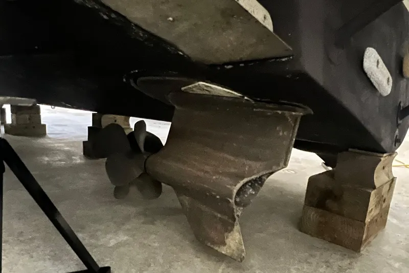 Slide: The Image of 2008 Four Winns 378 Vista boat propeller and hull on blocks in storage. - 41