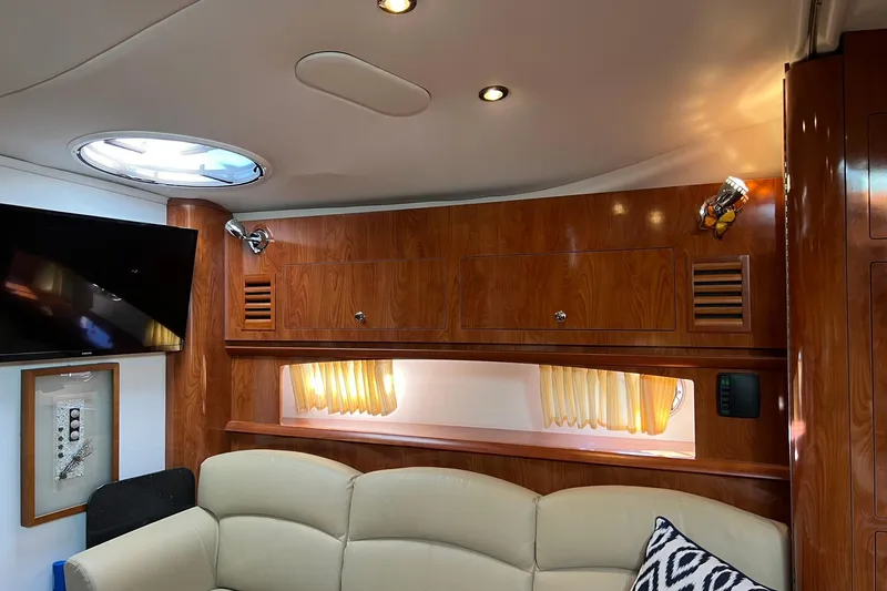 Slide: The Image of Luxurious interior of 2008 Four Winns 378 Vista yacht with wood paneling and modern amenities. - 48