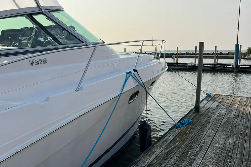 Slide: The Image of 2008 Four Winns 378 Vista yacht docked at marina, side view. - 5