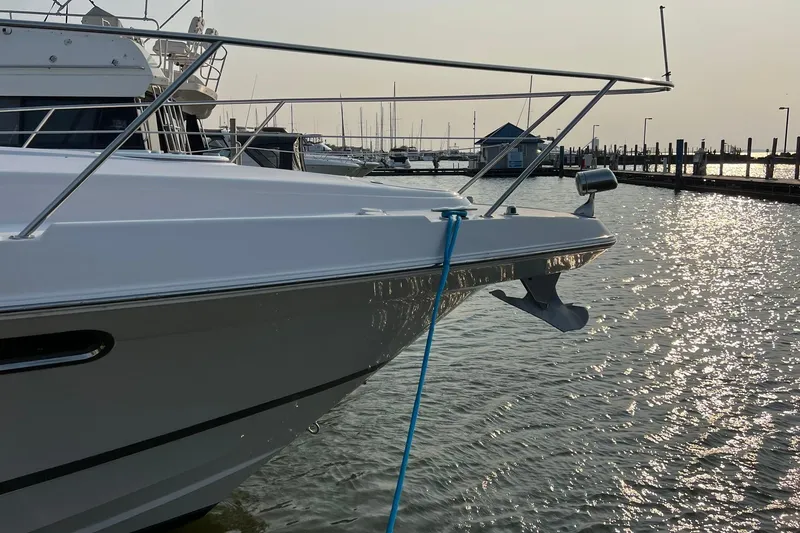 Slide: The Image of 2008 Four Winns 378 Vista yacht docked in a sunny marina. - 7