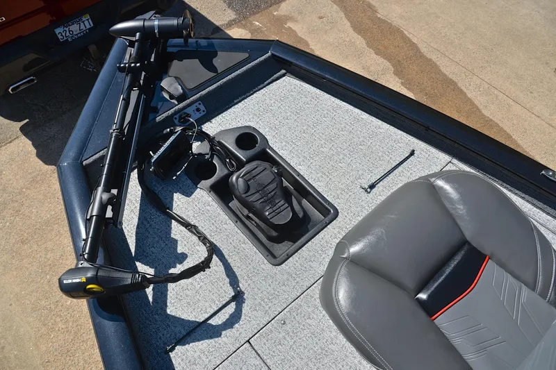 Slide: The Image of 2023 Bass Tracker PRO TEAM 190 boat interior with trolling motor and seating. - 27